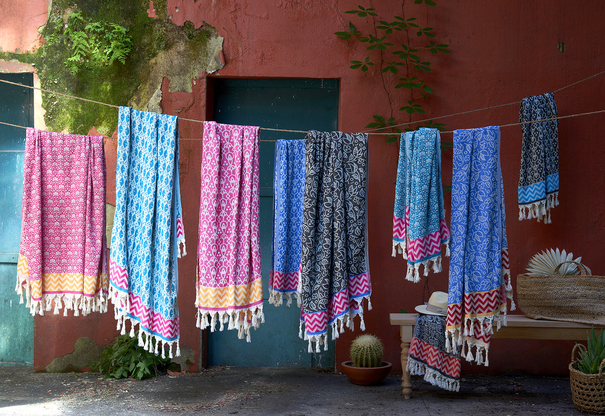 selection of turkish towels vibrant colours stylish contemporary design with tassels 