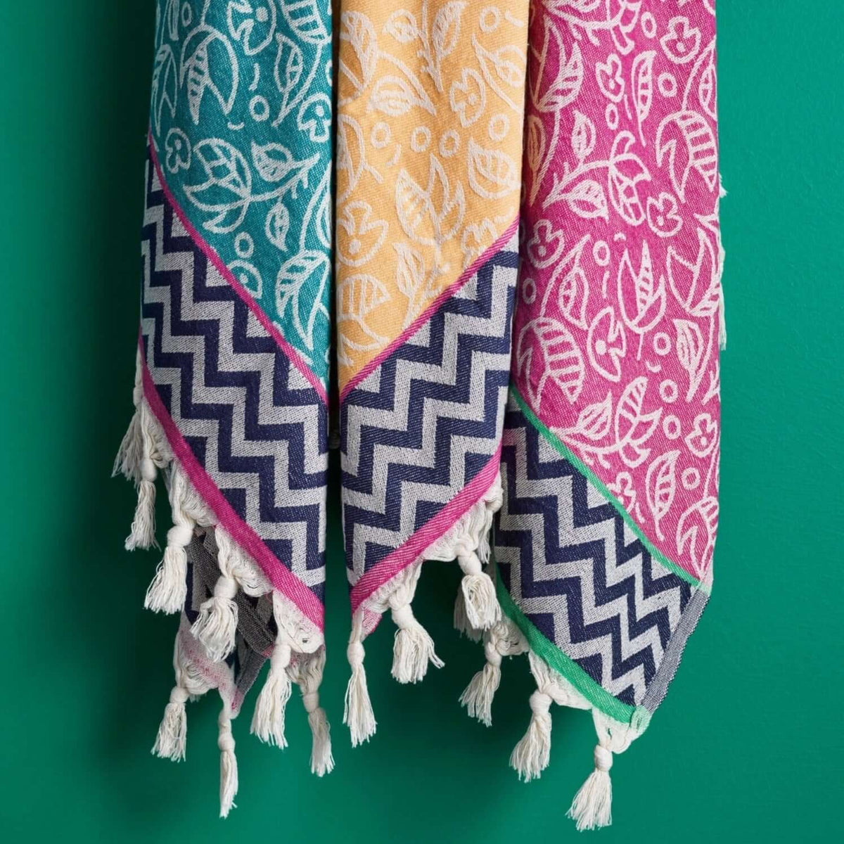 set of turkish towels flower and zigzag pattern with tassels knots vibrant colours fun design designer fashinable