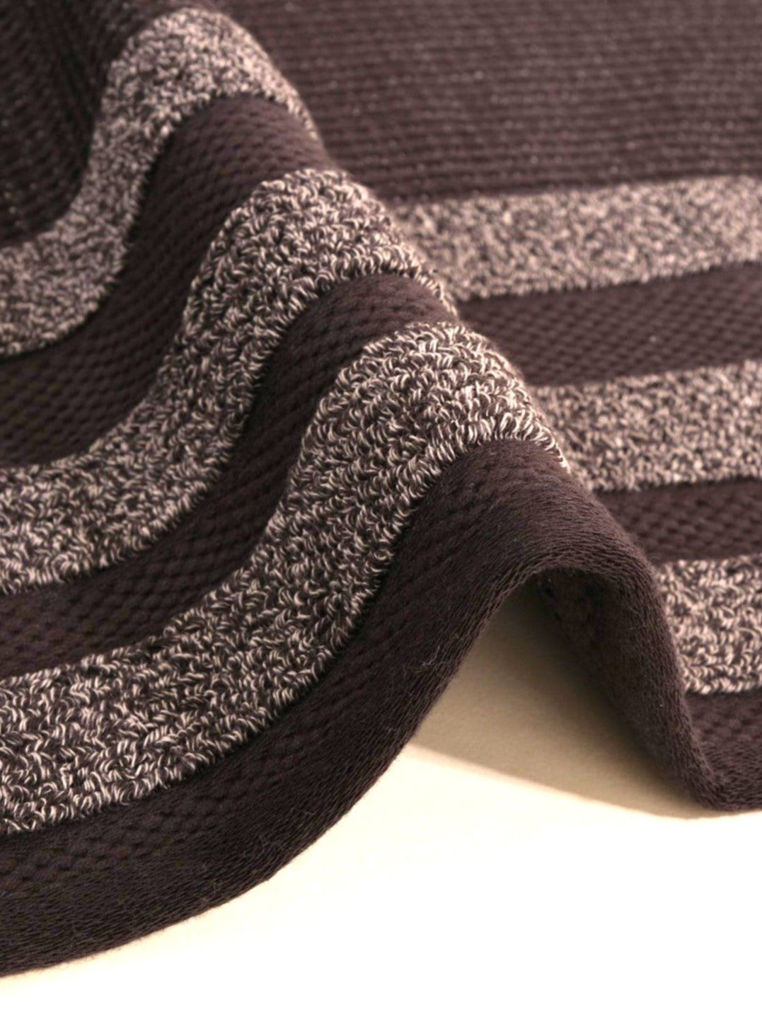 Luxury Turkish Bath towel with special texture; terry cloth and waffle weave on either side, anthracite close up 