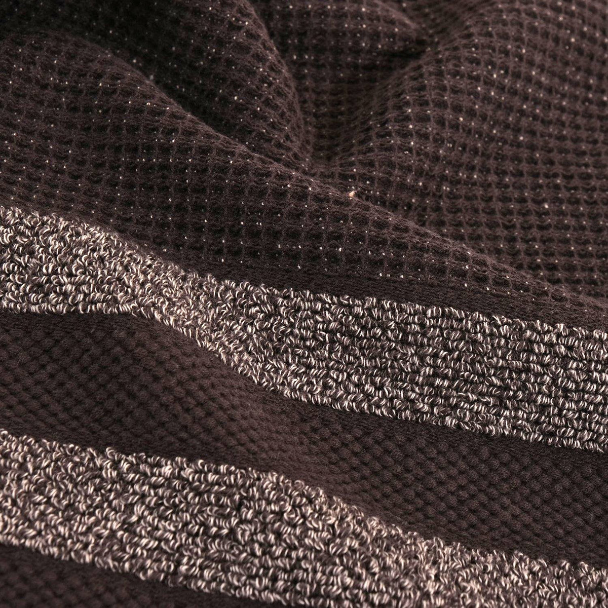 stripes of grey on anthracite on luxurious bath towel fabio