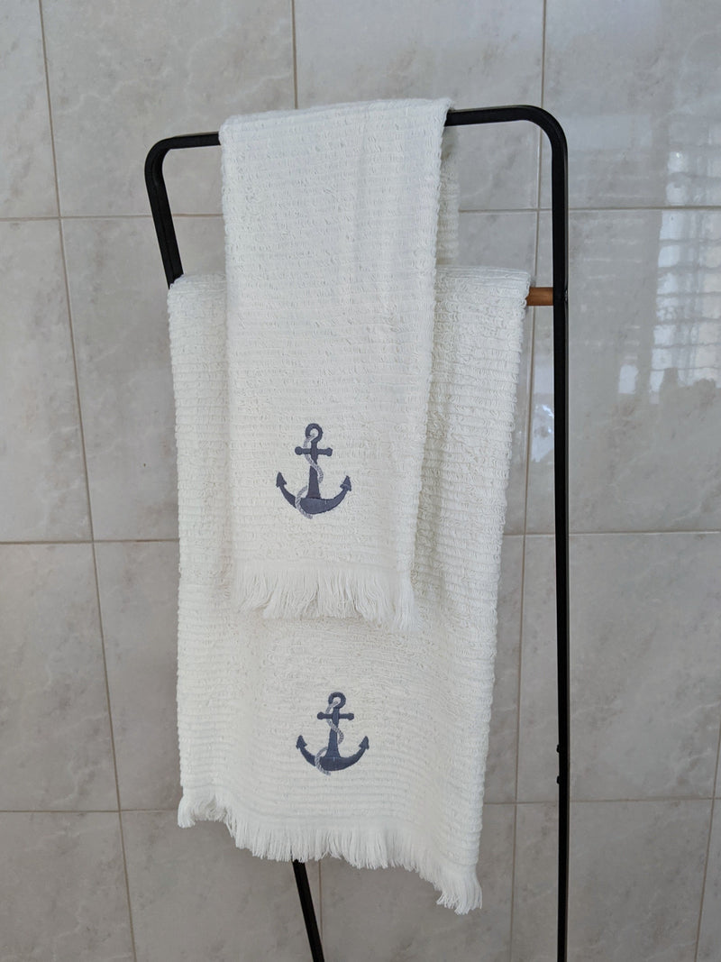 Turkish Hand and Bath Towel, Terry Off White with purple Anchor Embroidery on hanger 