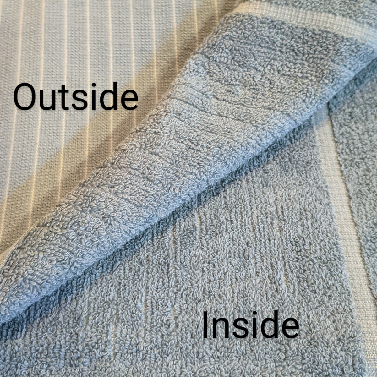 terry inside and flat woven outside layers of bathrobe fabric 